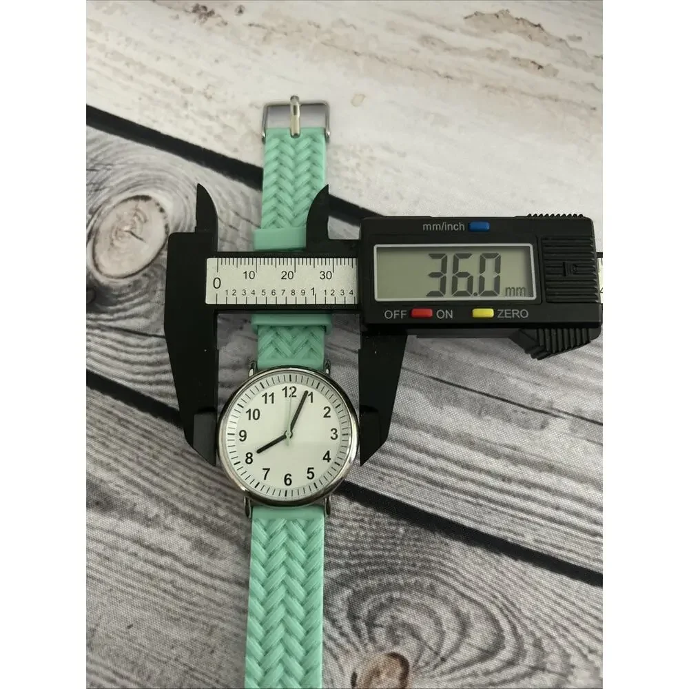 Silver Tone White Dial Mint Green Band Women’s Quartz Watch